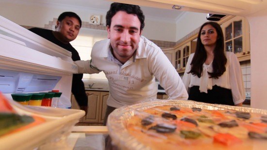Fadi longing for lunch break while Mario and the model look on, not amused it looks like!