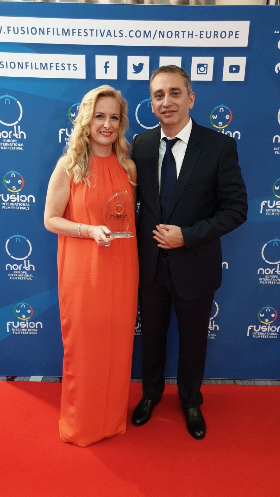 Dr Julie Sprakel and Mr Tareq Kanoo with the North Europe International Film Festival award for Thinking Pink: Resetting the NGO Model